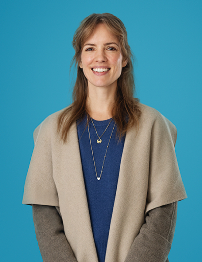 Woman smiling on blue background